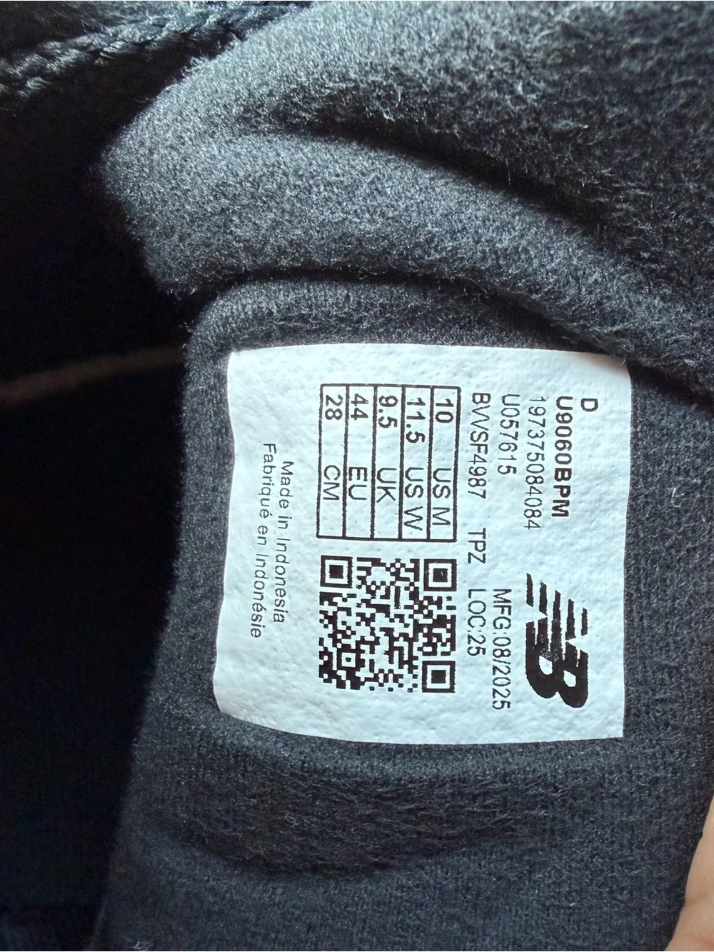 New Balance 9060 sneakers in a Triple Black colorway